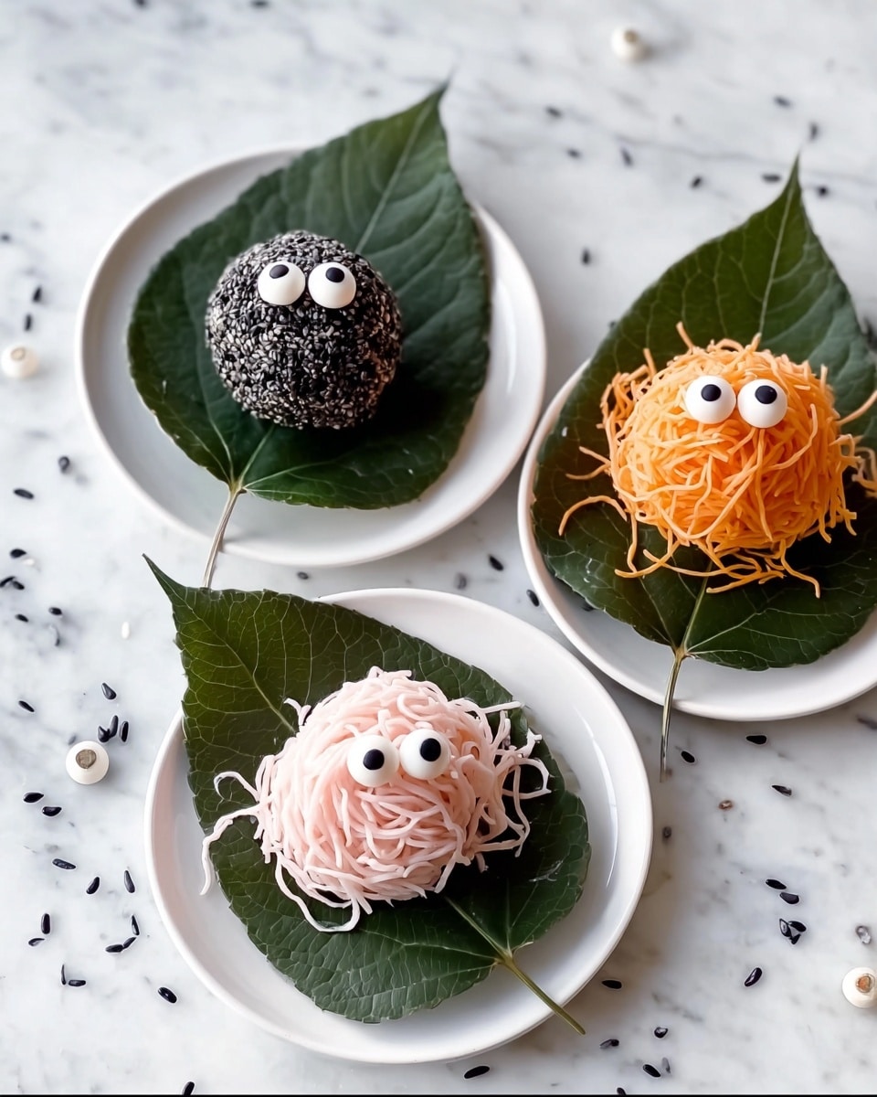 The image shows a white rectangular plate with ten round tomato balls arranged in four rows. The first row has three plain red tomato balls. The second row has two tomato balls decorated to look like jack-o'-lanterns with black sesame seed faces. The third row has four decorated tomato balls: one covered with shredded orange carrot and two small white eyes, one covered with shredded green herbs and two small white eyes, one covered with black sesame seeds and two small white eyes, and one partially peeled back to show white rice inside. The fourth row has one tomato ball covered with shredded orange carrot and small white eyes, and one covered with shredded green herbs and one white eye. The plate is set on a white marbled surface with a red cloth visible on the side. photo taken with an iphone --ar 4:5 --v 7