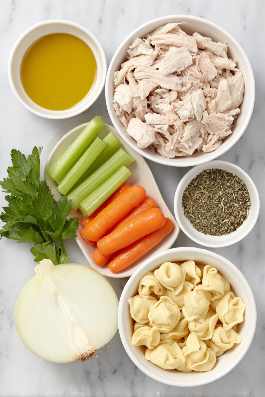 Flat lay of a small white ceramic bowl of golden olive oil, a halved medium yellow onion with layers visible, three bright green celery stalks trimmed and chopped, three vibrant orange carrots peeled and sliced, two peeled garlic cloves, a small white bowl filled with mixed dried Italian herbs, a white ceramic bowl holding light brown shredded cooked chicken, a handful of fresh flat-leaf parsley sprigs, a few uncooked cheese tortellini pasta pieces with folded ring shapes, and a white ceramic bowl filled with golden chicken broth, arranged with perfect symmetry and realistic proportions, placed on a clean white marble surface, soft natural light, photo taken with an iPhone, professional food photography style, fresh ingredients, white ceramic bowls, no bottles, no duplicates, no utensils, no packaging --ar 2:3 --v 7 --p m7354615311229779997 - Chicken Tortellini Soup, easy chicken tortellini soup, hearty tortellini soup, comforting chicken soup, quick weeknight soup