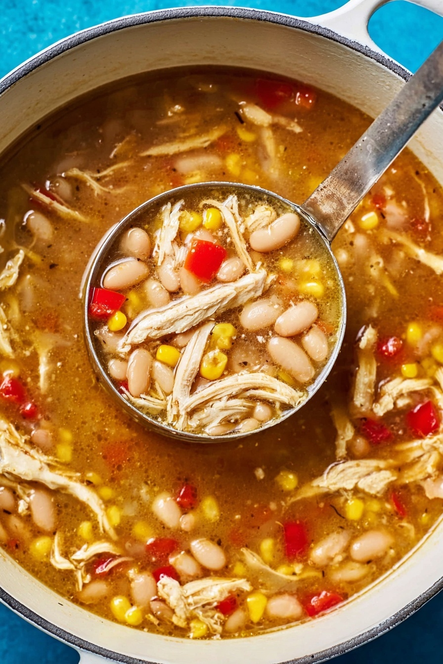 The image shows a white pot filled with a thick soup made of shredded white chicken, white beans, yellow corn kernels, and small red bell pepper pieces. The soup broth is brown and slightly shiny, looking warm and rich. A metal ladle is scooping a portion of the soup, lifting it just over the surface, showing a dense mix of chicken, beans, corn, and red peppers. The pot sits on a bright blue surface, contrasting with the white pot and the colorful soup inside. Photo taken with an iphone --ar 2:3 --v 7 - White Bean Chicken Chili, creamy chicken chili, hearty white bean chili, easy chicken chili recipe, spicy white bean chili